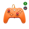 GameSir G7 SE Xbox Wired Controller in vibrant orange with magnetic faceplate and Hall Effect sticks.